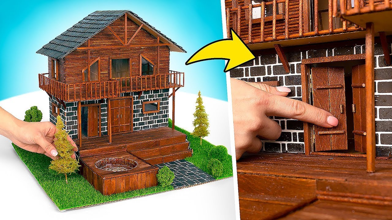 Cómo construir una casa de lujo de cartón y palos de madera